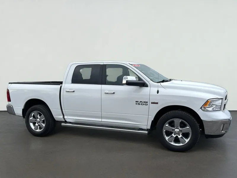 2017 RAM 1500 SLT in Bright White Clearcoat — front three-quarter view