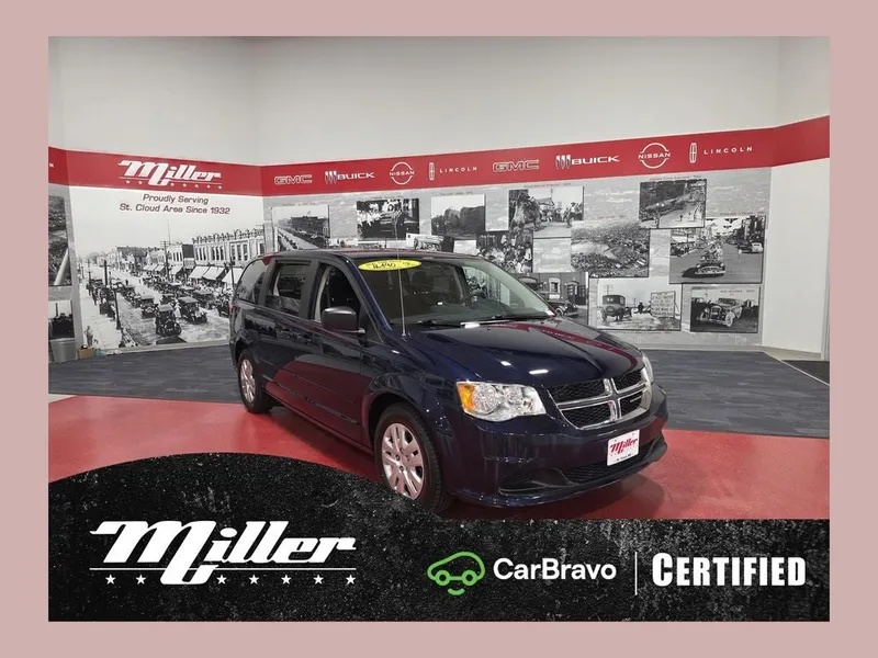 2016 Dodge Grand Caravan SE CarBravo Certified in True Blue Pearlcoat — front three-quarter view