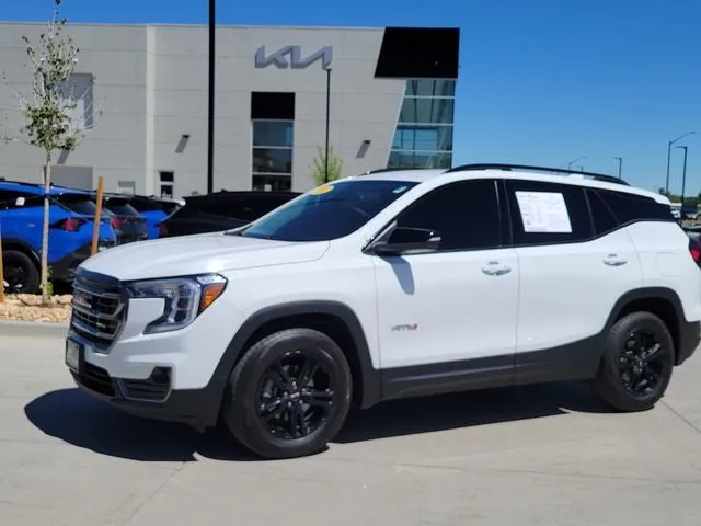 2023 GMC Terrain AT4 in Summit White — front three-quarter view