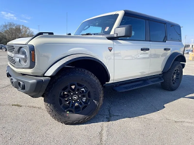 2026 Ford Bronco Badlands in Desert Sand — front three-quarter view