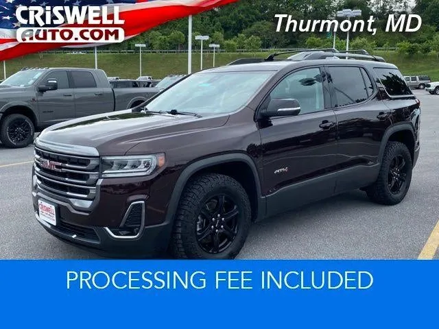 2021 GMC Acadia AT4 in Red Mahogany Metallic — front three-quarter view