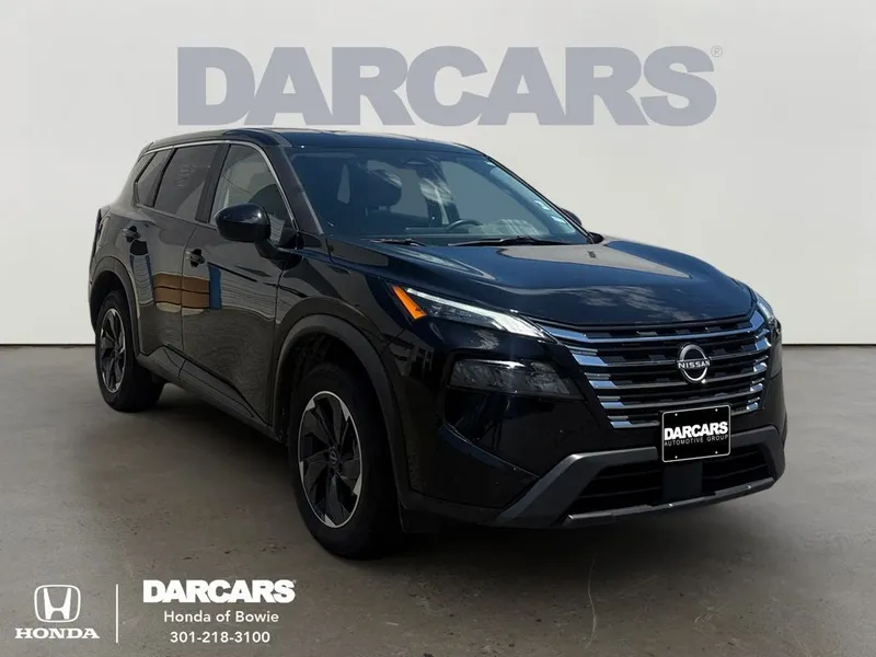 2025 Nissan Rogue SV in Super Black — front three-quarter view