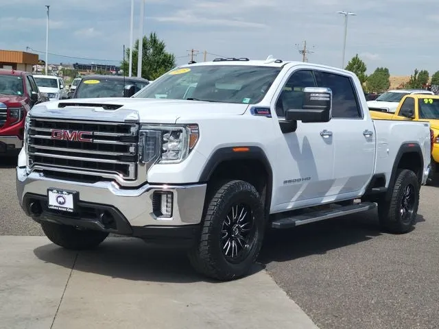 2023 GMC Sierra 2500HD SLT in Summit White — front three-quarter view
