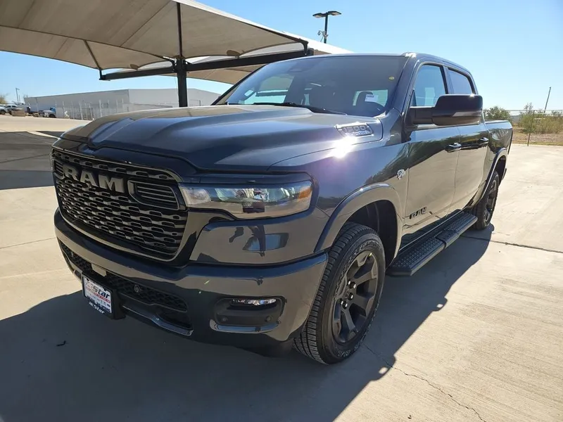 2026 RAM 1500 Big Horn/Lone Star in Forged Blue Metallic — front three-quarter view