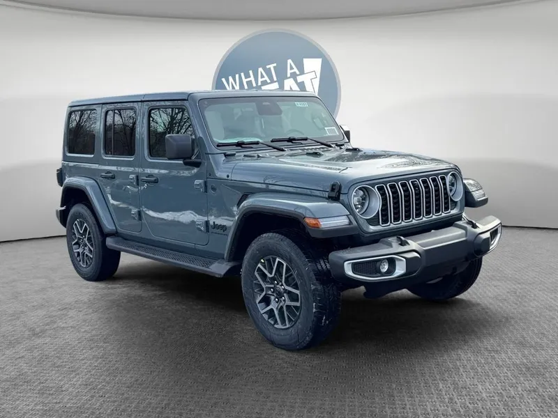 2026 Jeep Wrangler WRANGLER 4-DOOR SAHARA in Anvil Clear-Coat Exterior Paint — front three-quarter view