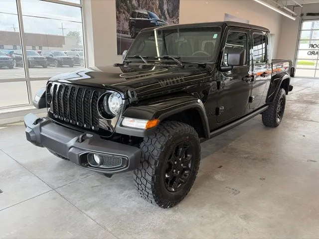 2023 Jeep Gladiator Willys 4x4 in Black Clearcoat — front three-quarter view