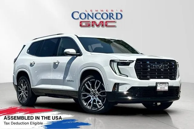 2026 GMC Acadia Denali Ultimate in Summit White — front three-quarter view