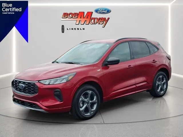2024 Ford Escape ST-Line in Rapid Red Metallic Tinted Clearcoat — front three-quarter view