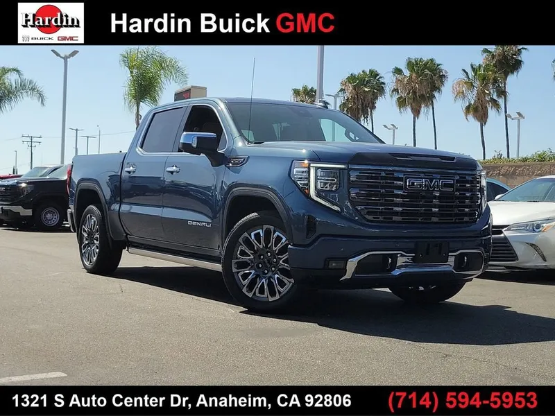 2026 GMC Sierra 1500 Denali Ultimate in Downpour Metallic — front three-quarter view