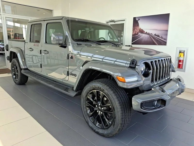 2023 Jeep Gladiator High Altitude 4x4 in Sting-Gray Clearcoat — front three-quarter view