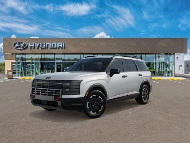 2026 Hyundai PALISADE XRT Pro in White Pearl — front three-quarter view